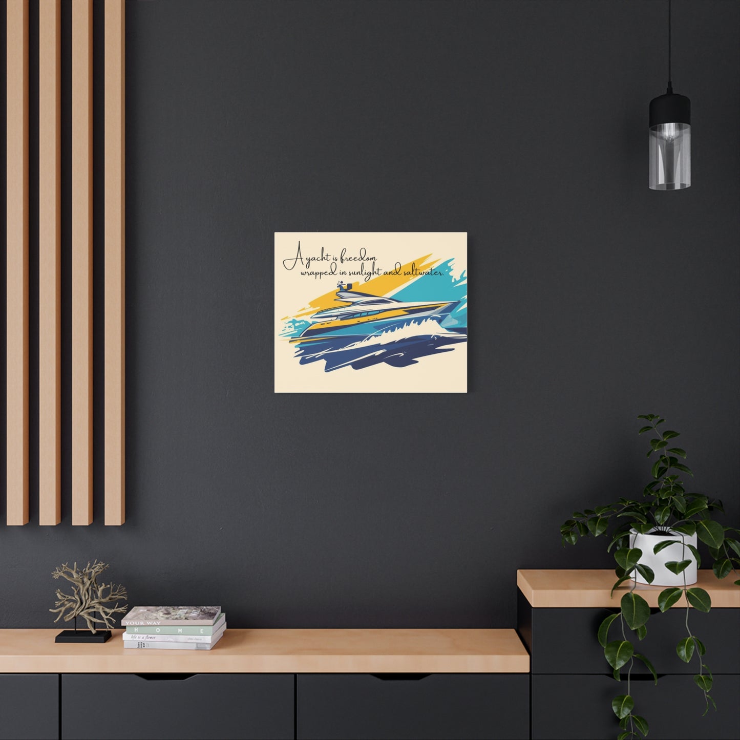 Yacht wall art canvas on a dark wall with a wooden shelf and plant below.