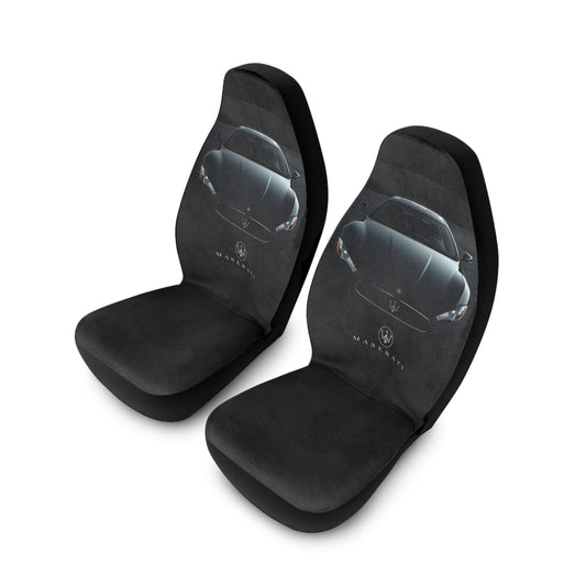 Two black car seat covers with Maserati logo on a white background