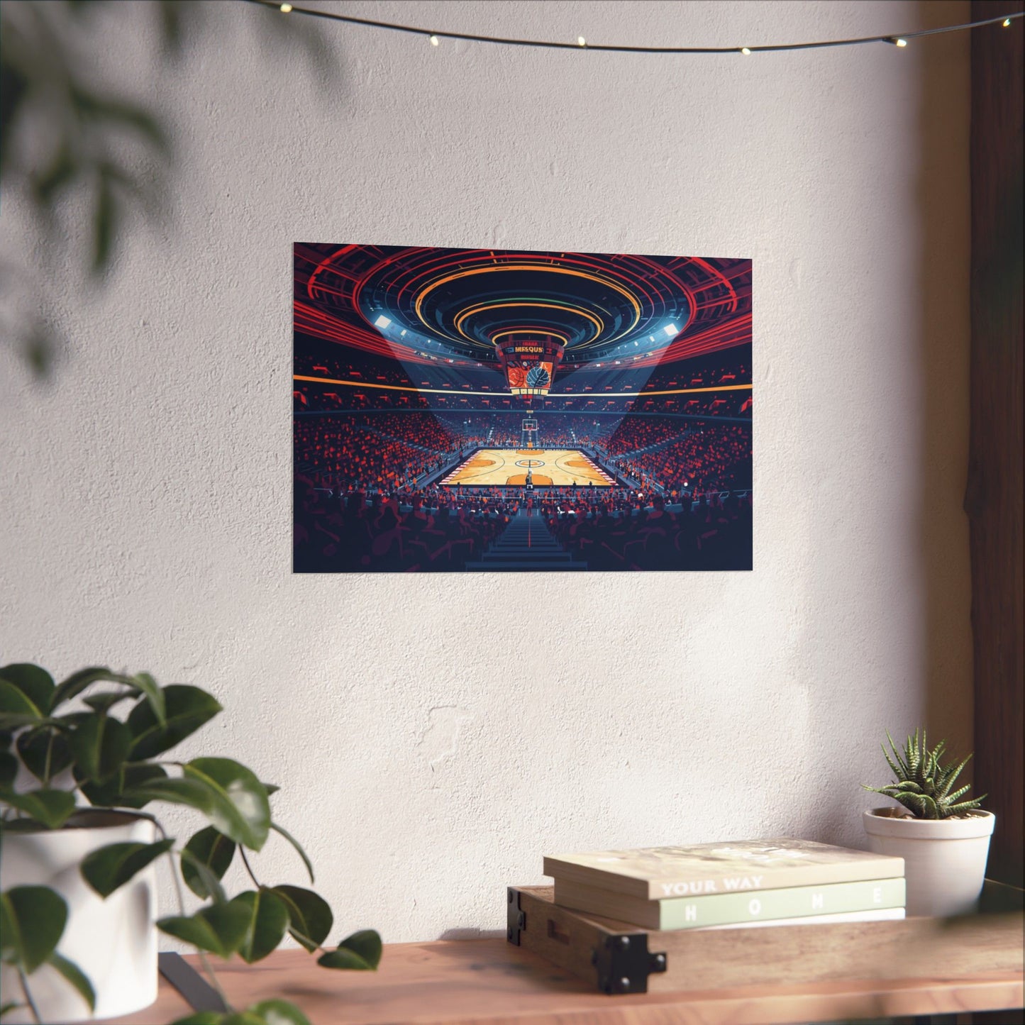 Artistic depiction of a basketball arena on a wall above a desk with plants.
