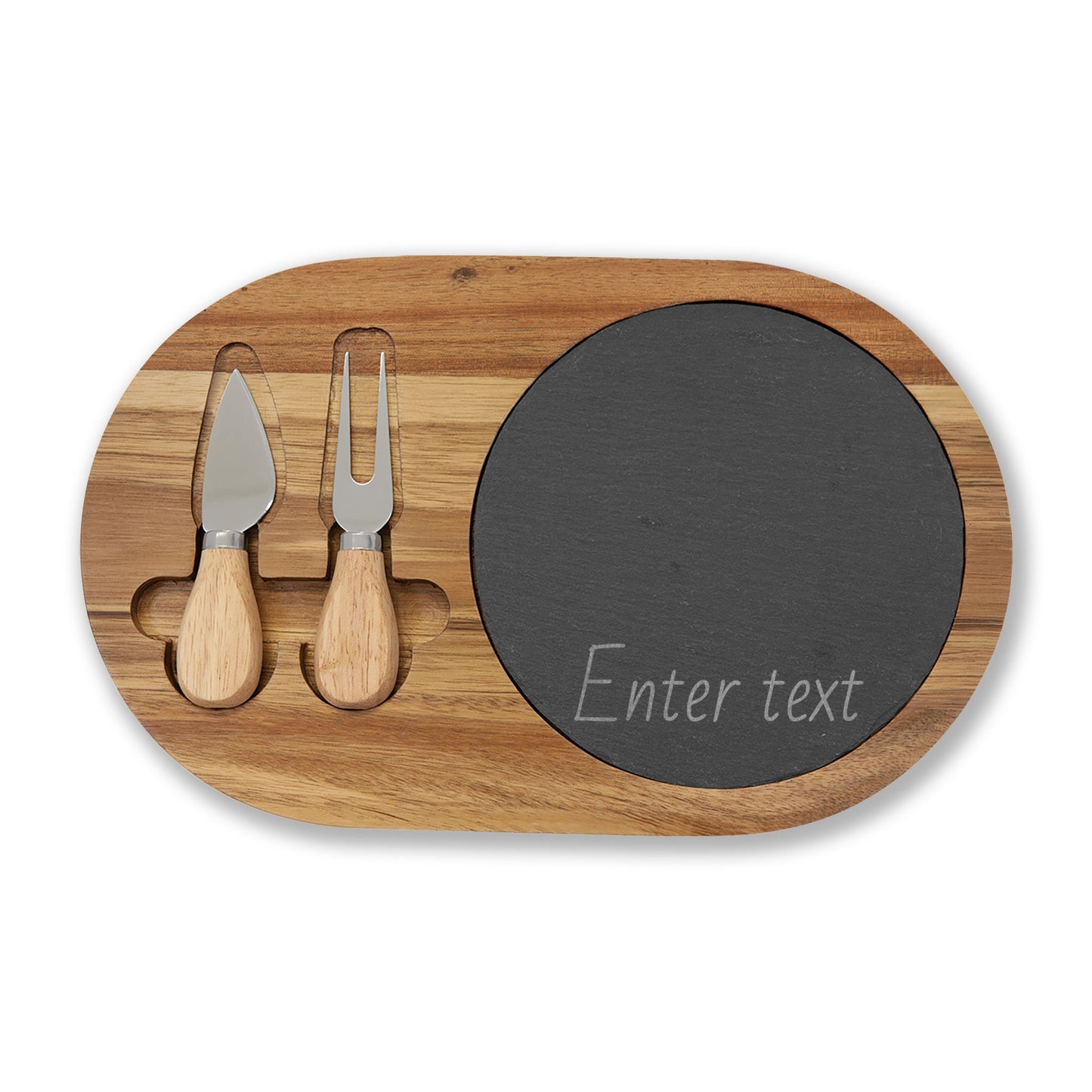 Wooden cutting board with slate surface, cheese knife, and fork on a white background