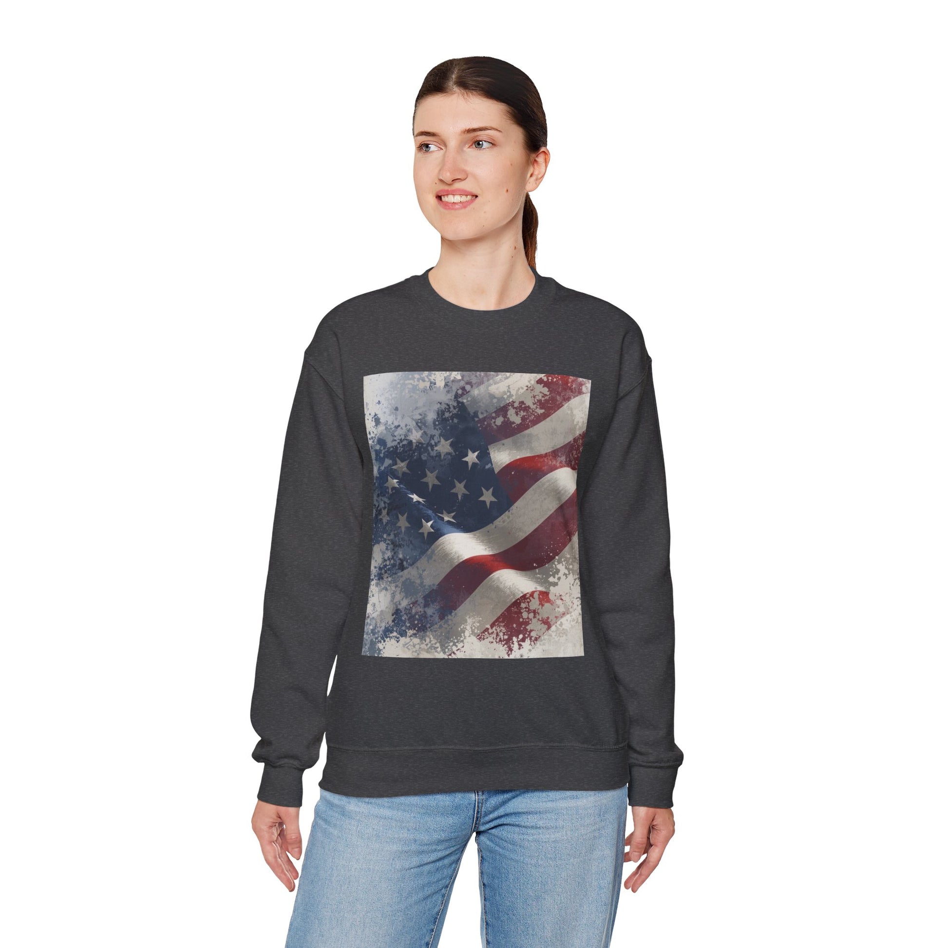 Woman wearing a dark gray sweatshirt with a vintage American flag design on a white background