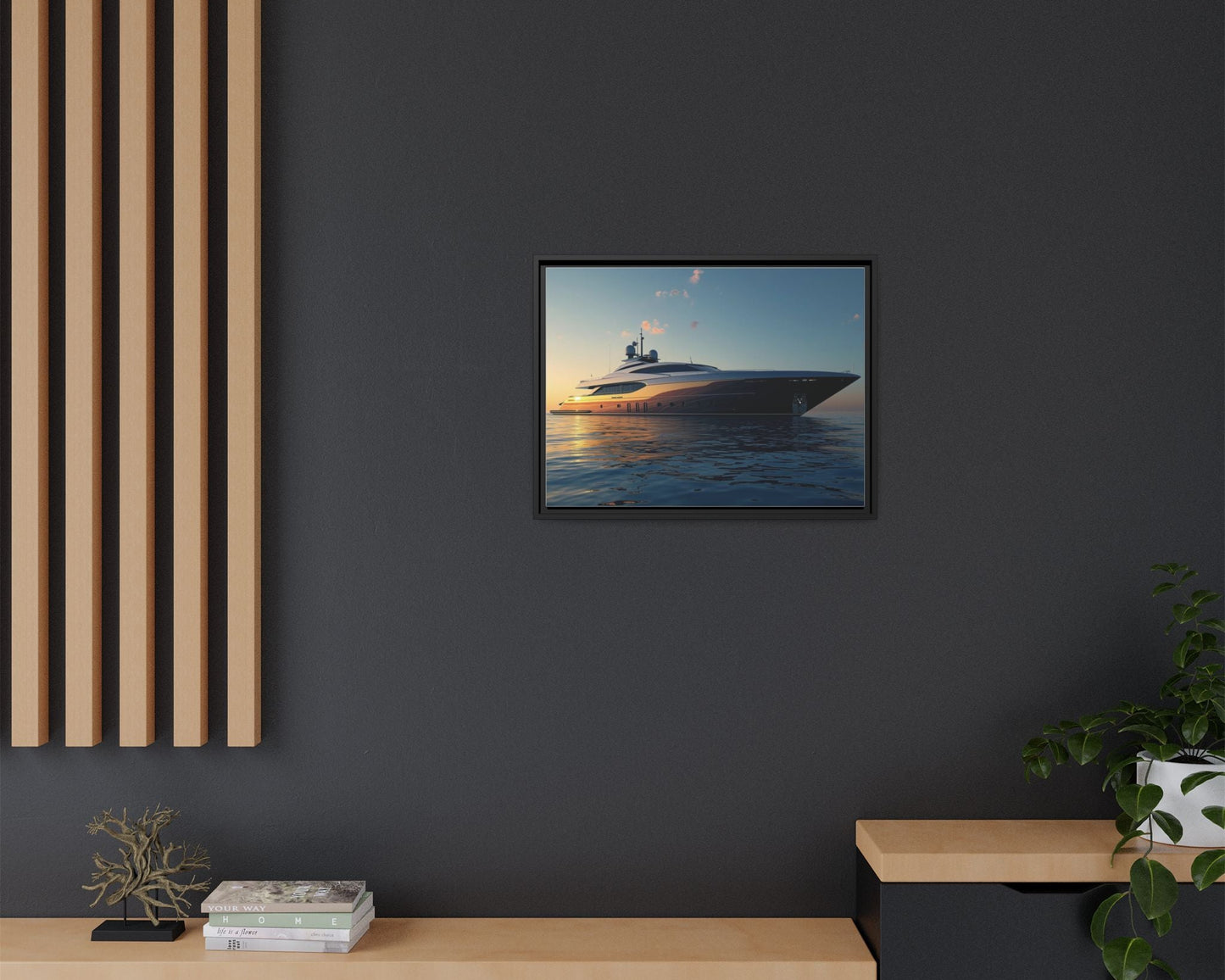 Framed picture of a yacht on a dark wall with wooden furniture and decor.