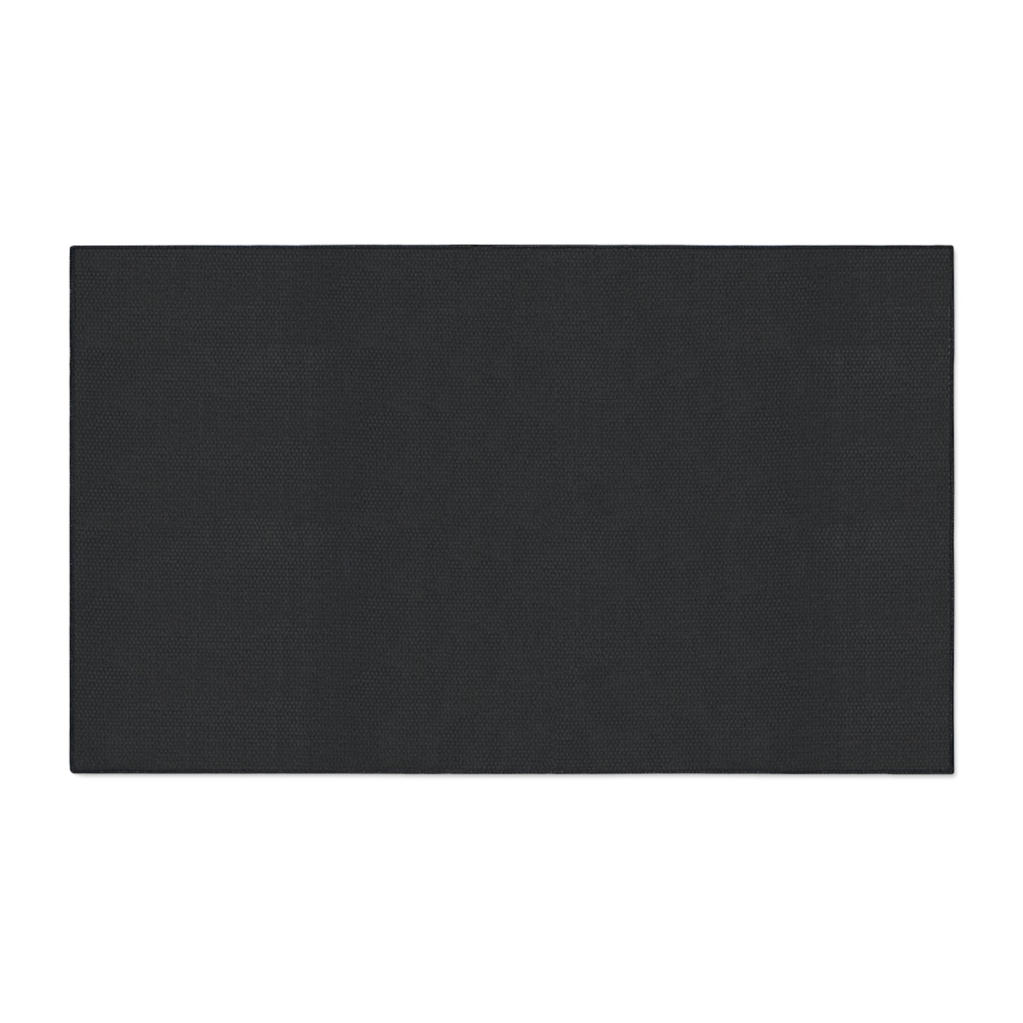 Rectangular black non-slip rubber backing on a white background