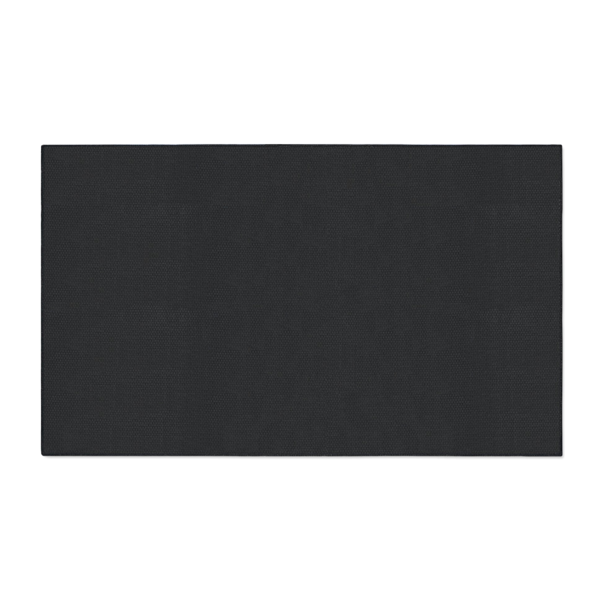 Rectangular black non-slip rubber backing on a white background