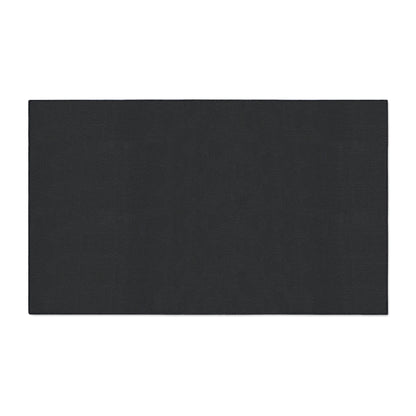 Rectangular black non-slip rubber backing on a white background