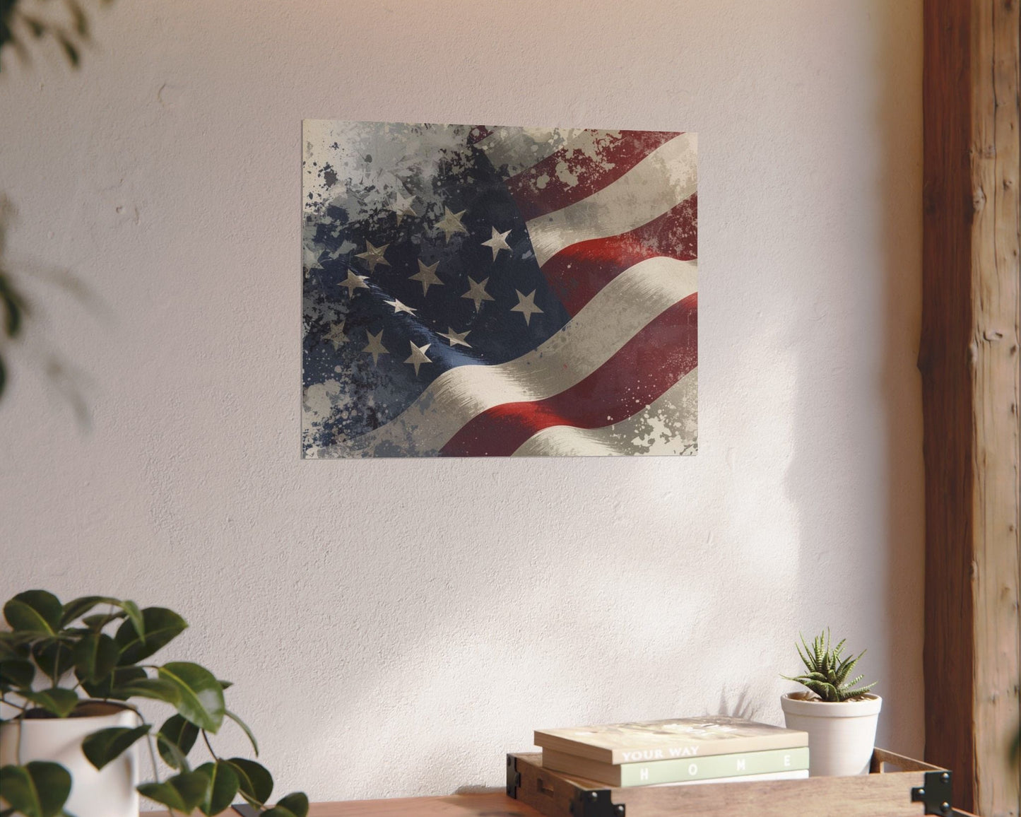 American flag painting on a wall above a wooden table with plants