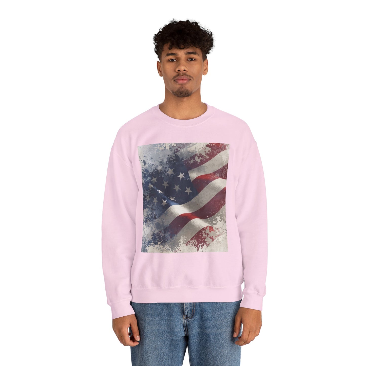 Man wearing a pink sweatshirt with a vintage American flag design on a white background