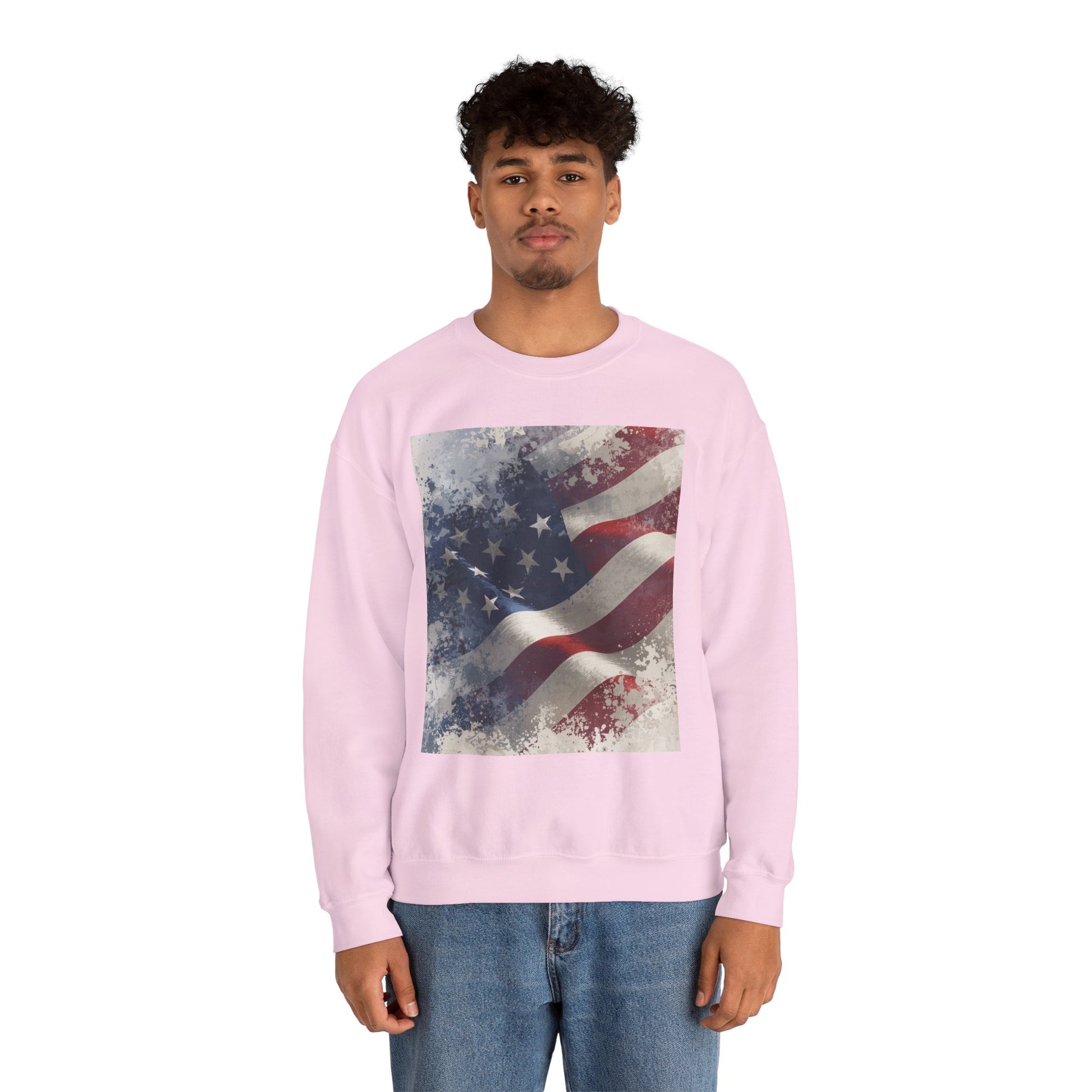 Man wearing a pink sweatshirt with a vintage American flag design on a white background