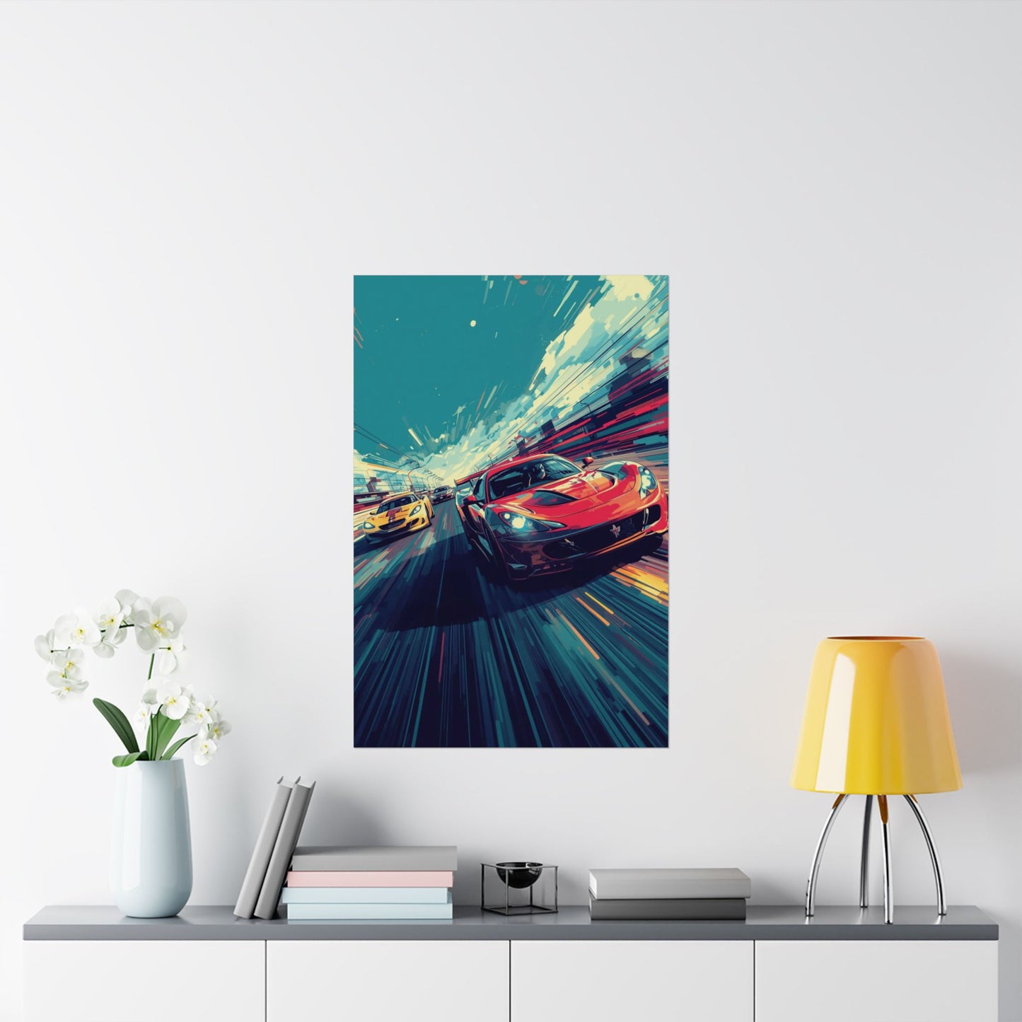 Framed artwork of a red sports car on a wall above a shelf with decor items.
