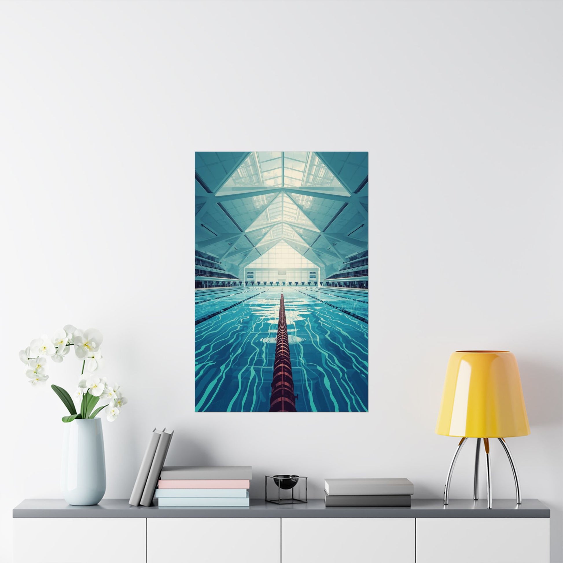 Framed artwork of a pool with geometric ceiling on a wall above a shelf with decor items.