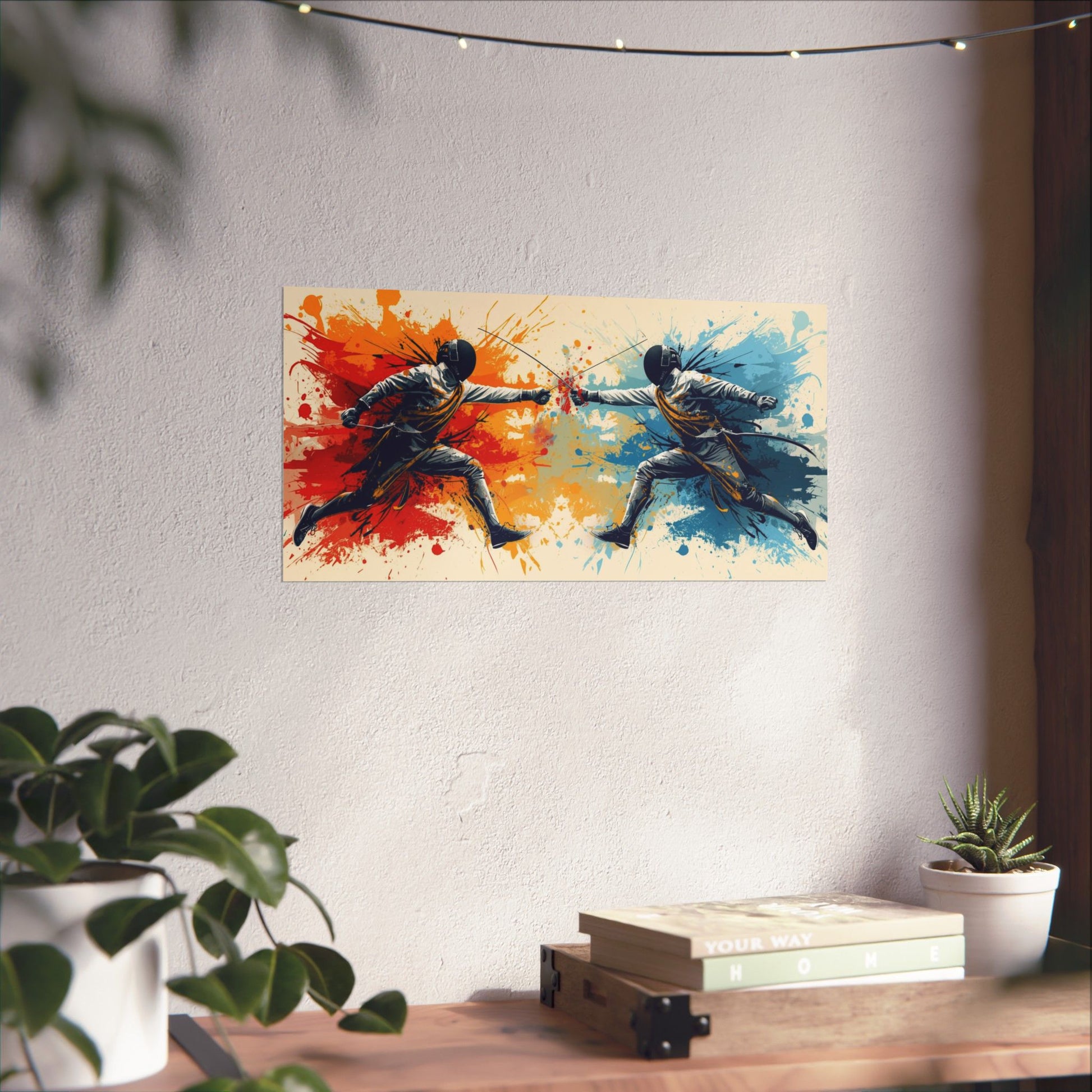Colorful painting of two figures in a dynamic pose on a wall above a wooden desk with plants.