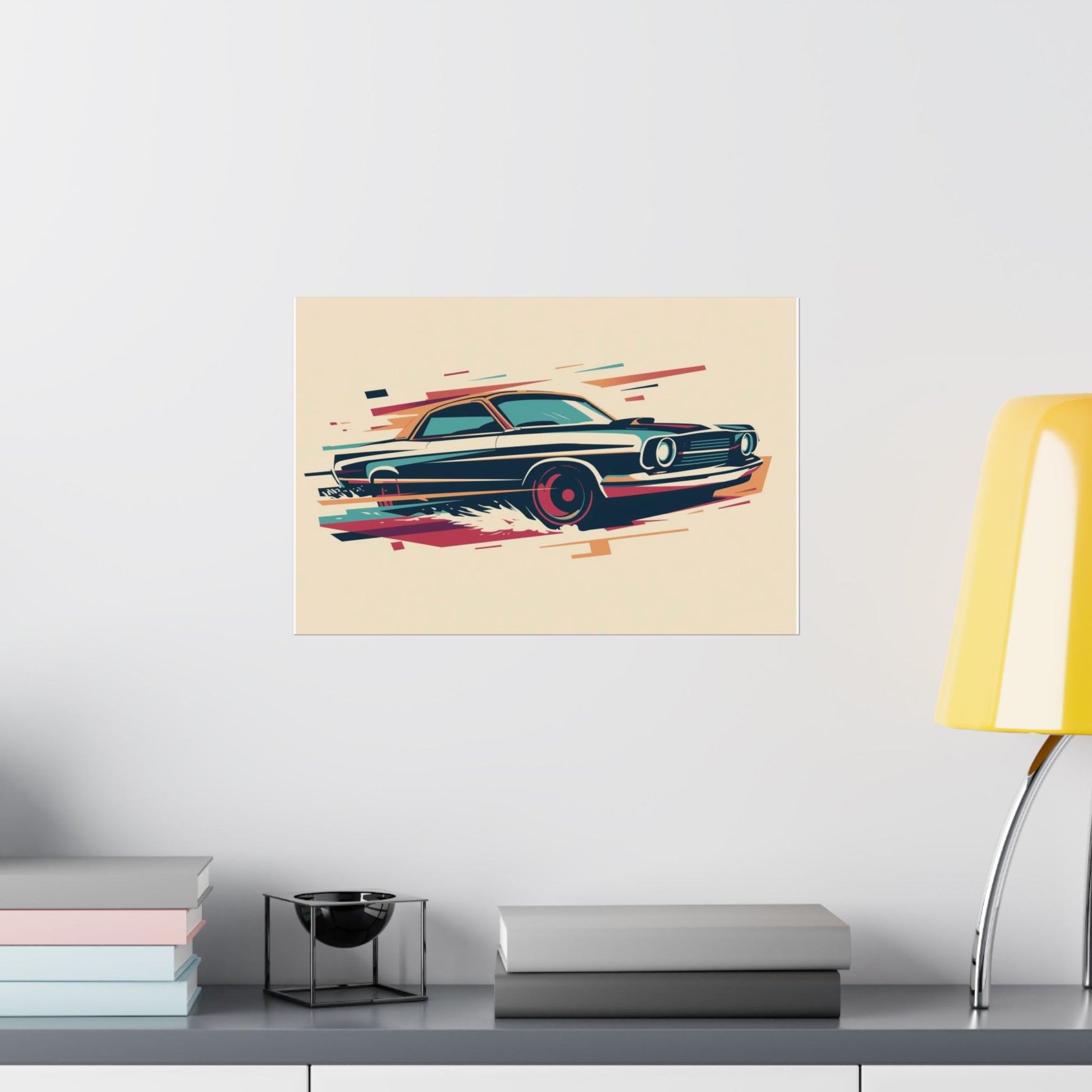 Poster of a classic vintage car on a wall above a desk with books and a lamp.