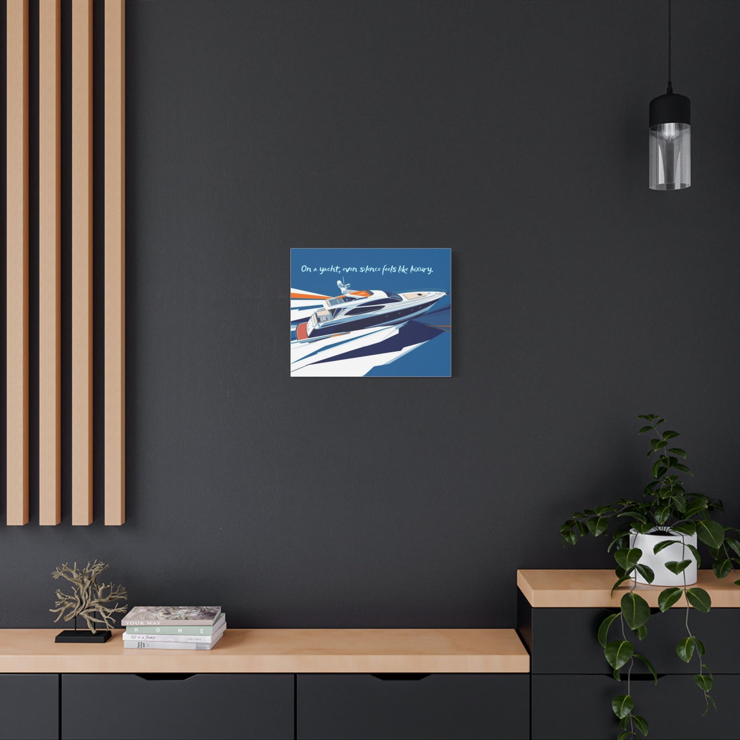 Canvas wall art of a yacht on a dark wall with wooden shelves and decor.