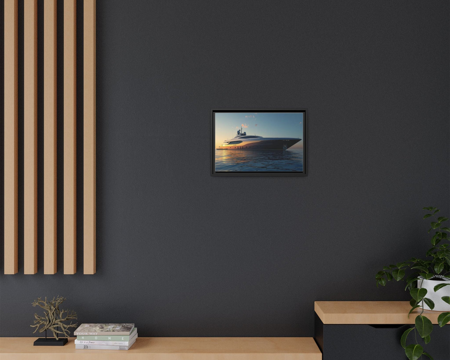 Framed picture of a yacht on a dark wall with wooden furniture and decor.