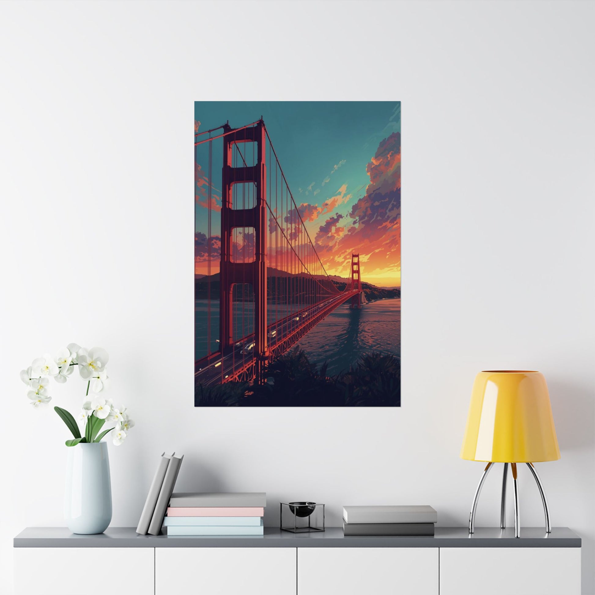 Poster of the Golden Gate Bridge on a wall above a shelf with decor items.