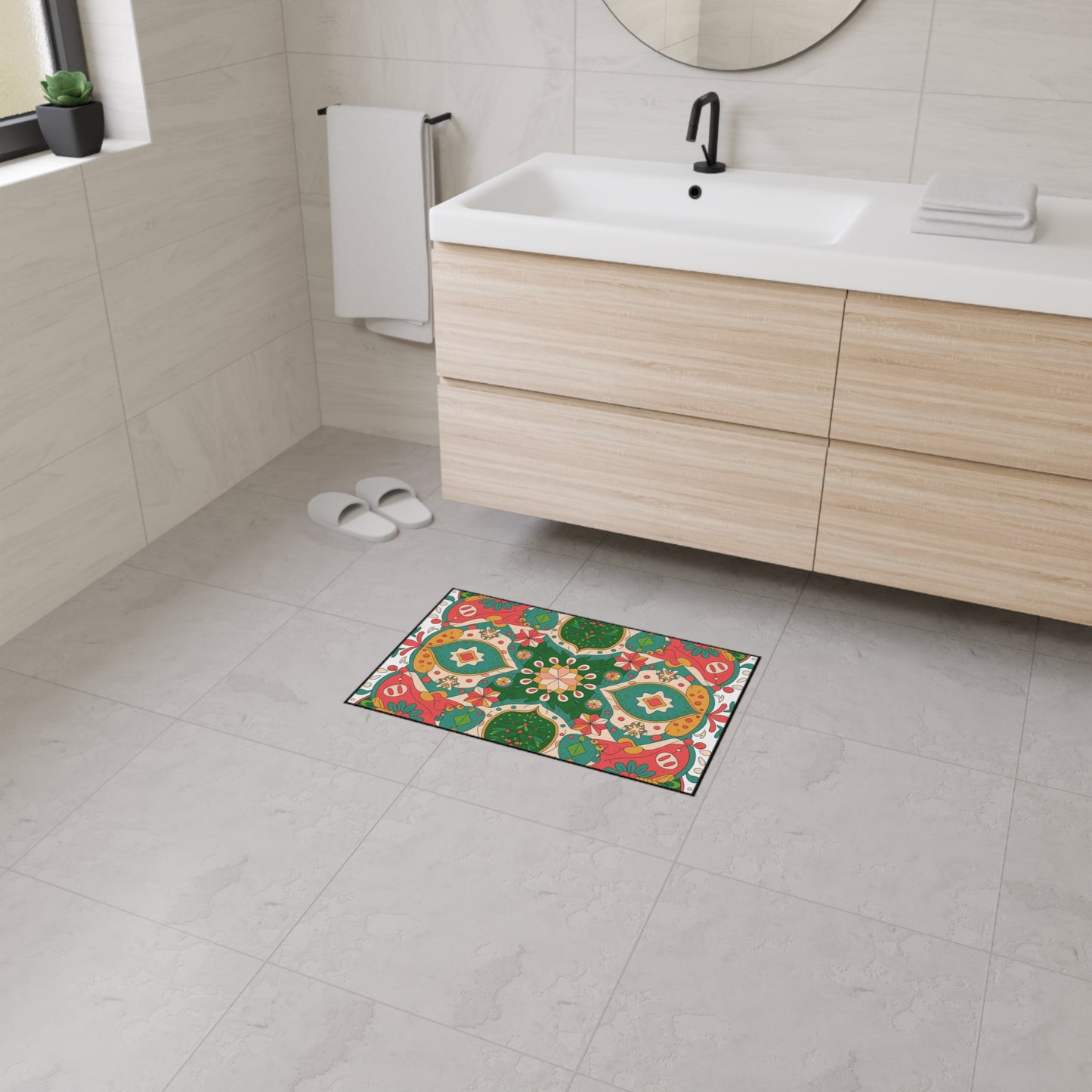 Decorative bath mat with a colorful pattern on a bathroom floor.