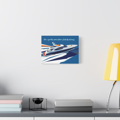 Framed artwork of a yacht on a white wall above a desk with books and a lamp.