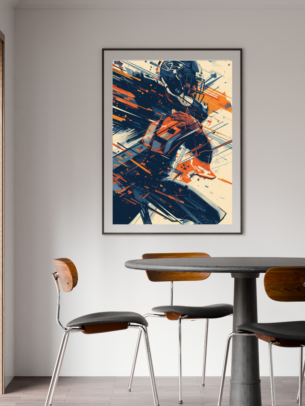 Abstract art print on a wall above a dining table with chairs