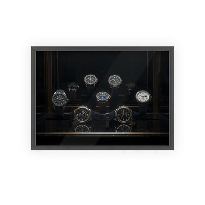 Collection of watches in a black display case on a white background