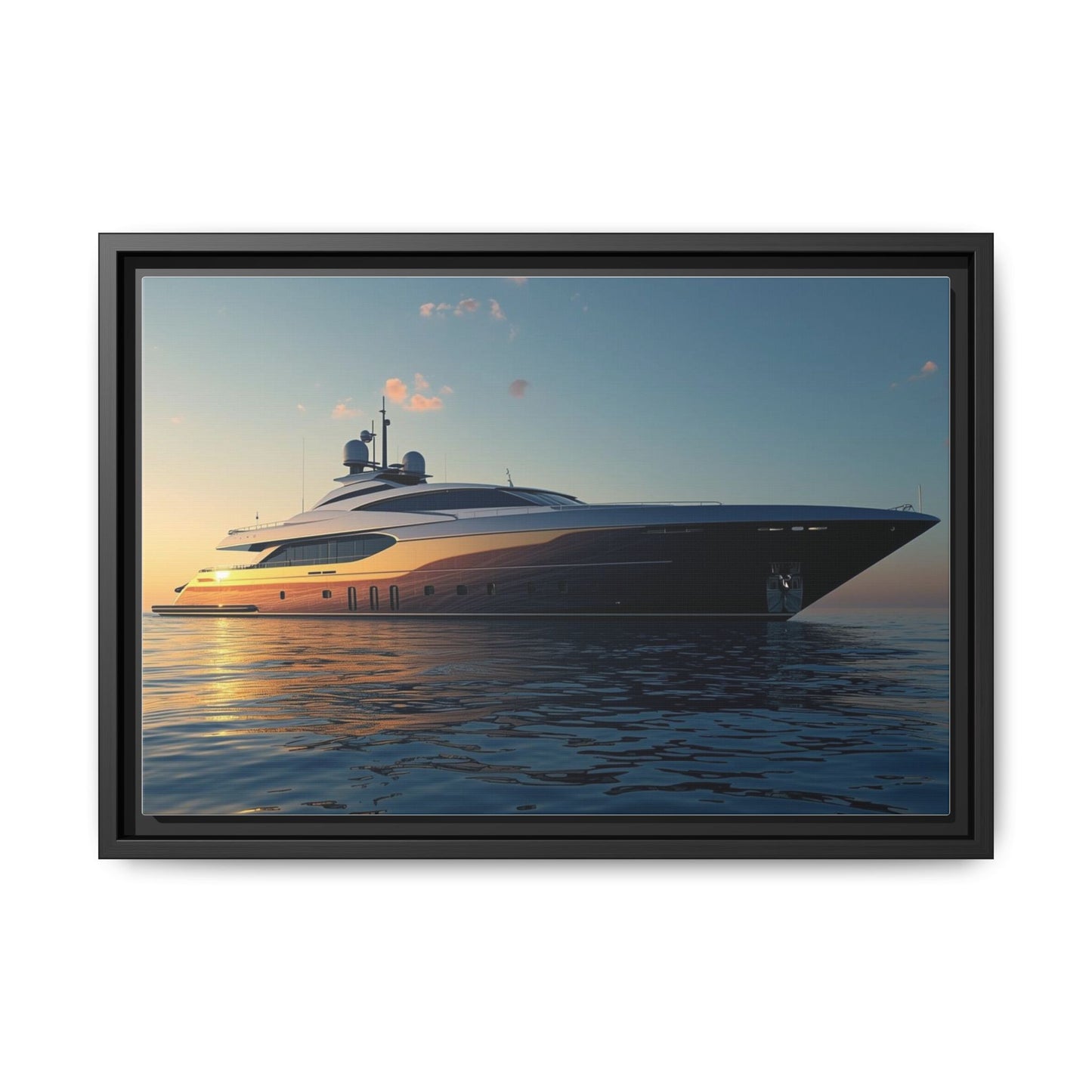 Framed photograph of a luxury yacht on the water with a sunset sky.