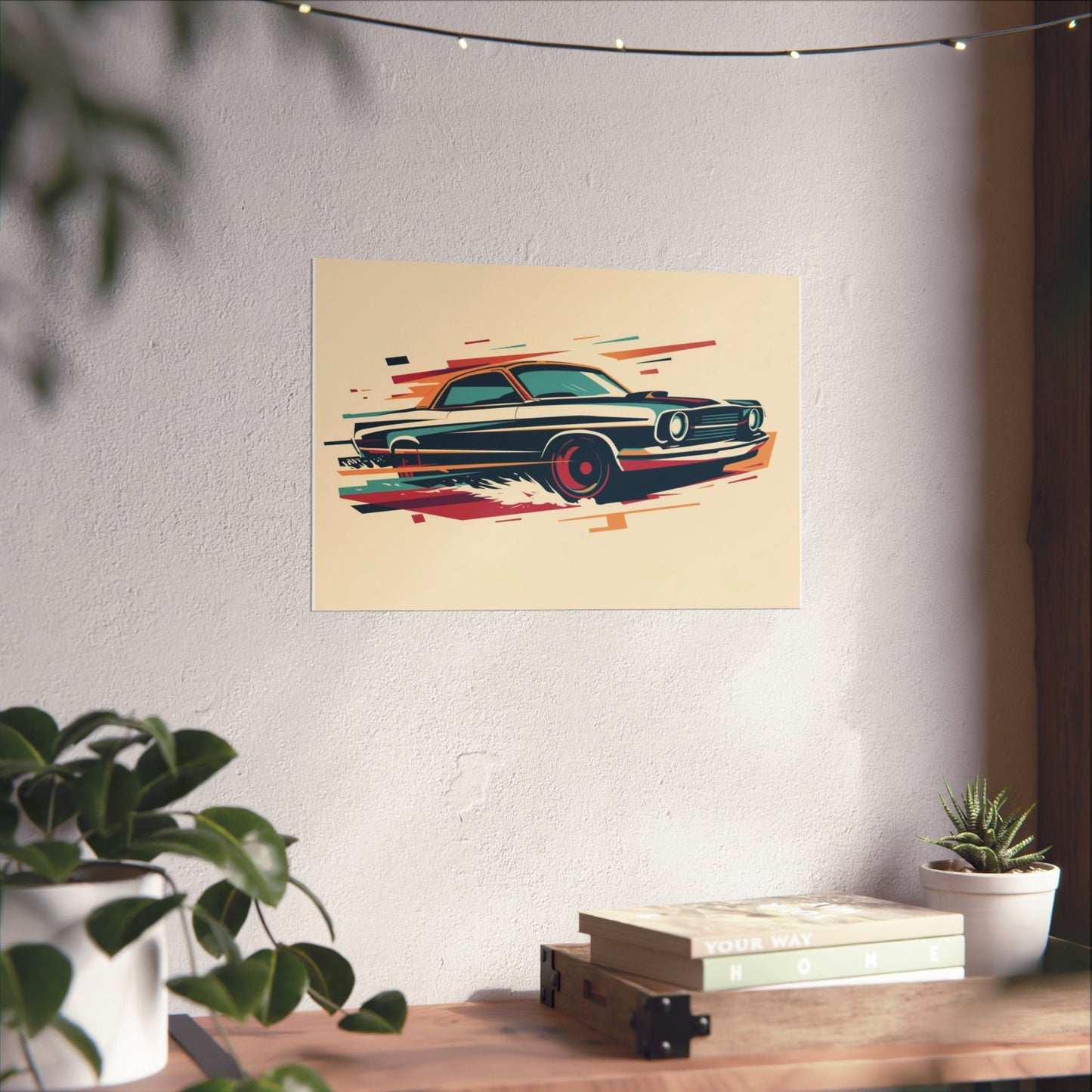 Poster of a classic car on a wall above a desk with plants and books.