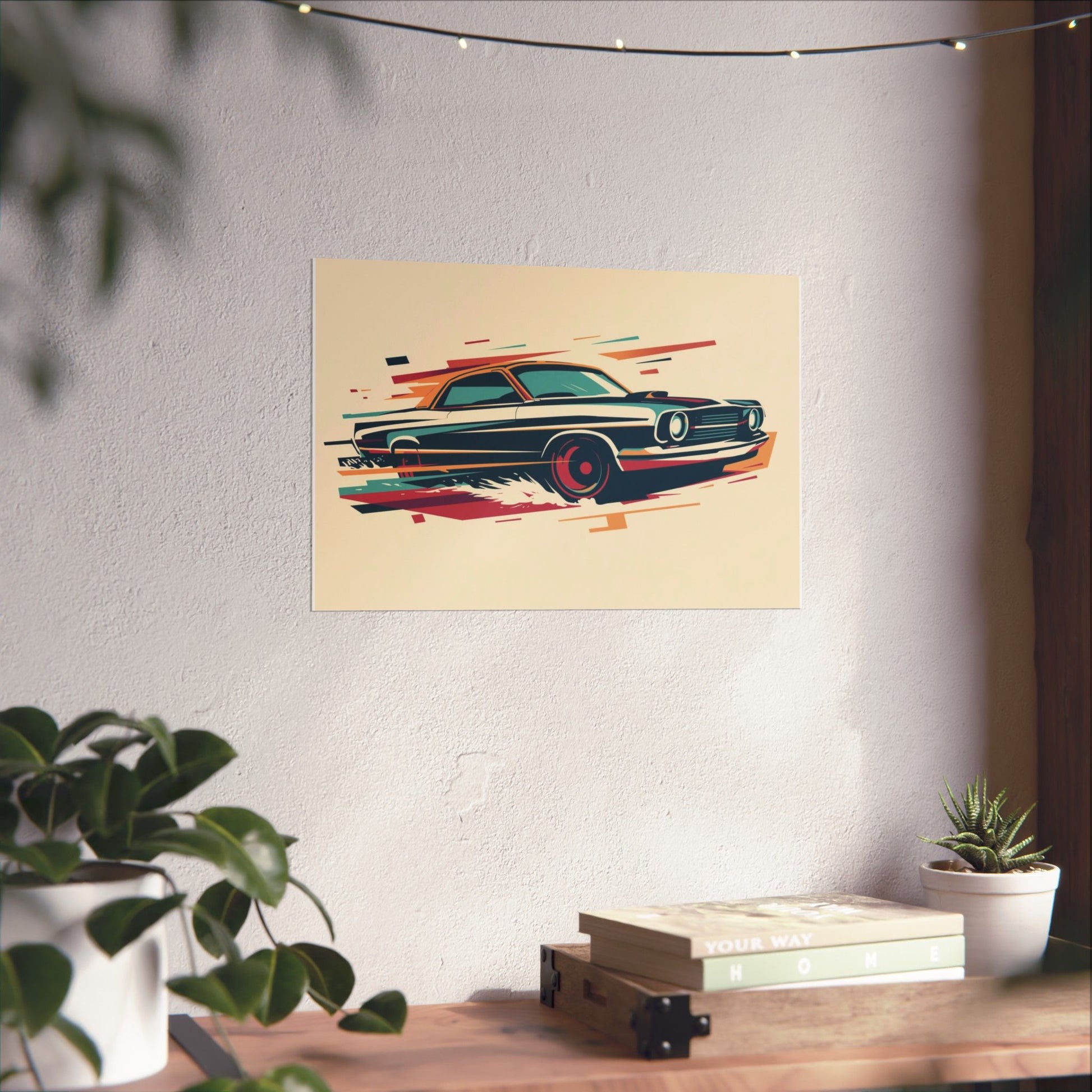 Poster of a classic car on a wall above a desk with plants and books.