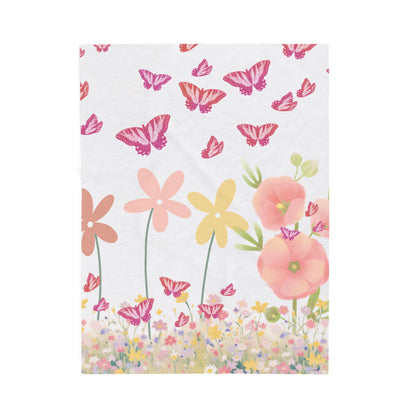 Floral and butterfly blanket on a white background