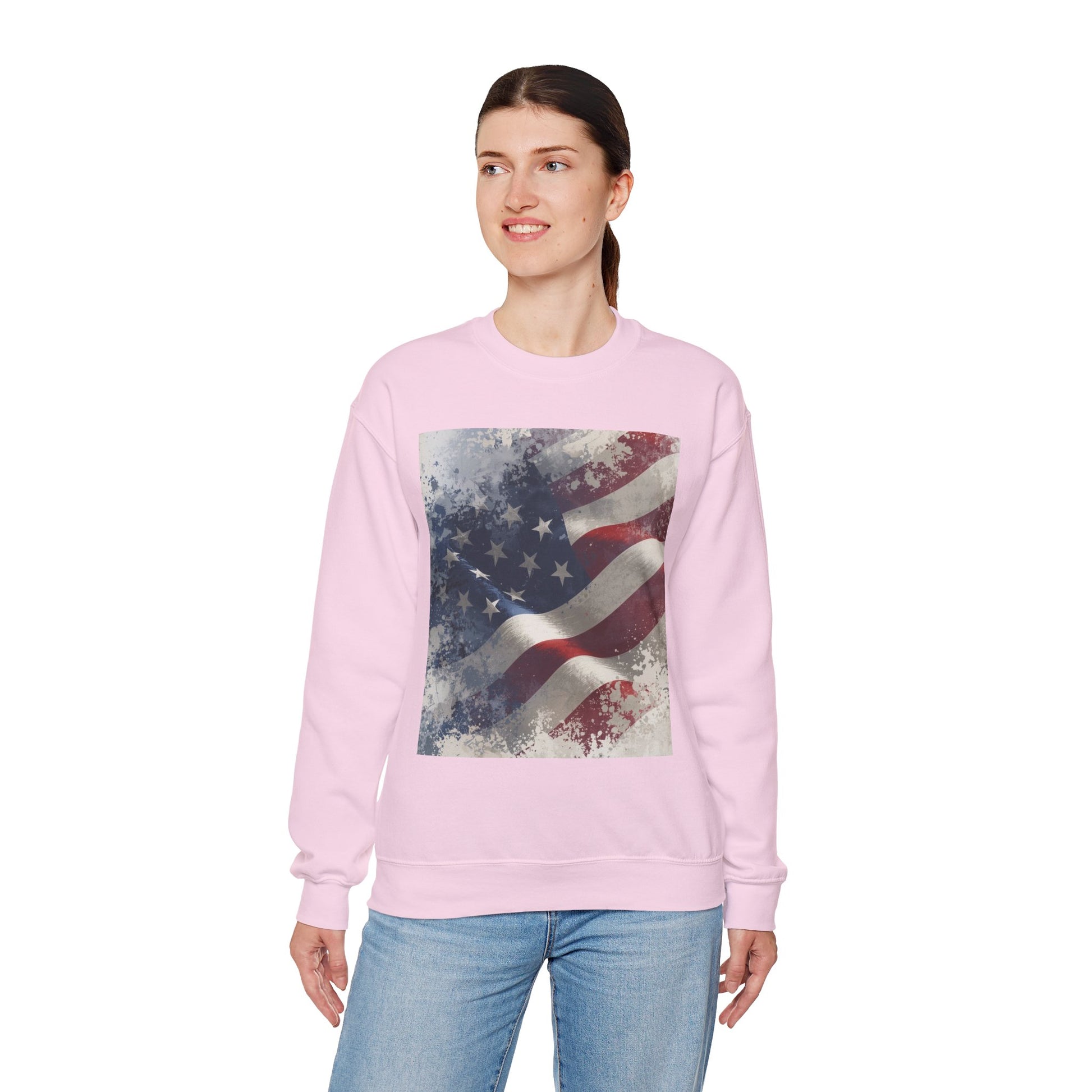 Woman wearing a pink sweatshirt with a vintage American flag design on a white background