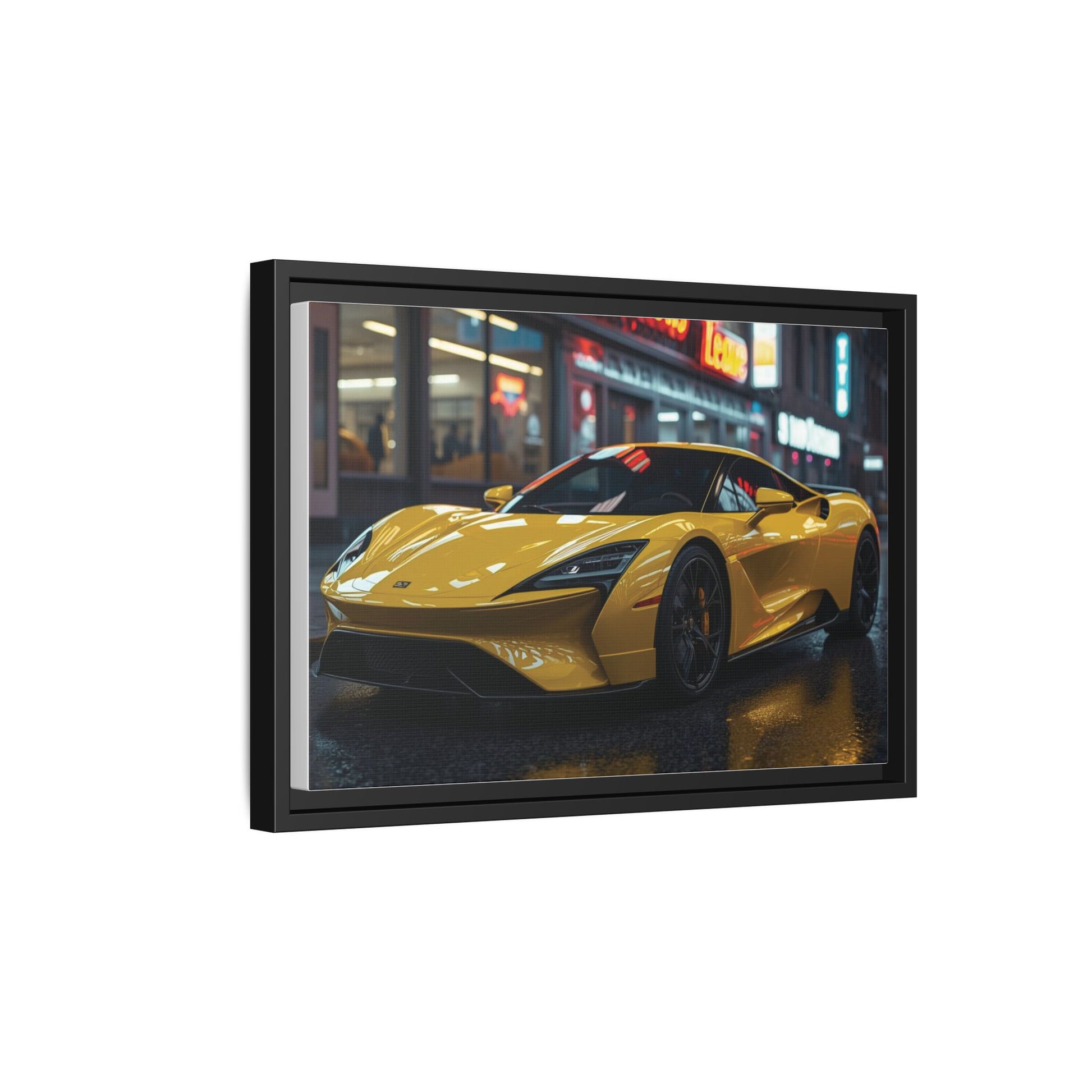 Framed artwork of a yellow sports car on a city street at night.