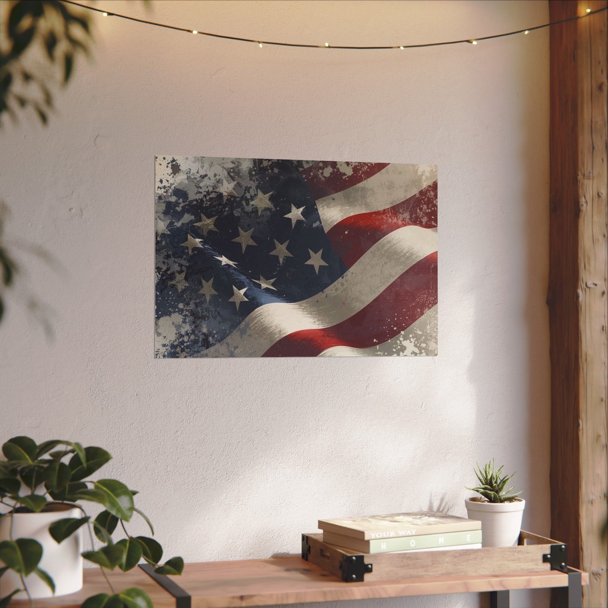 American flag painting on a wall with a wooden table and plants below