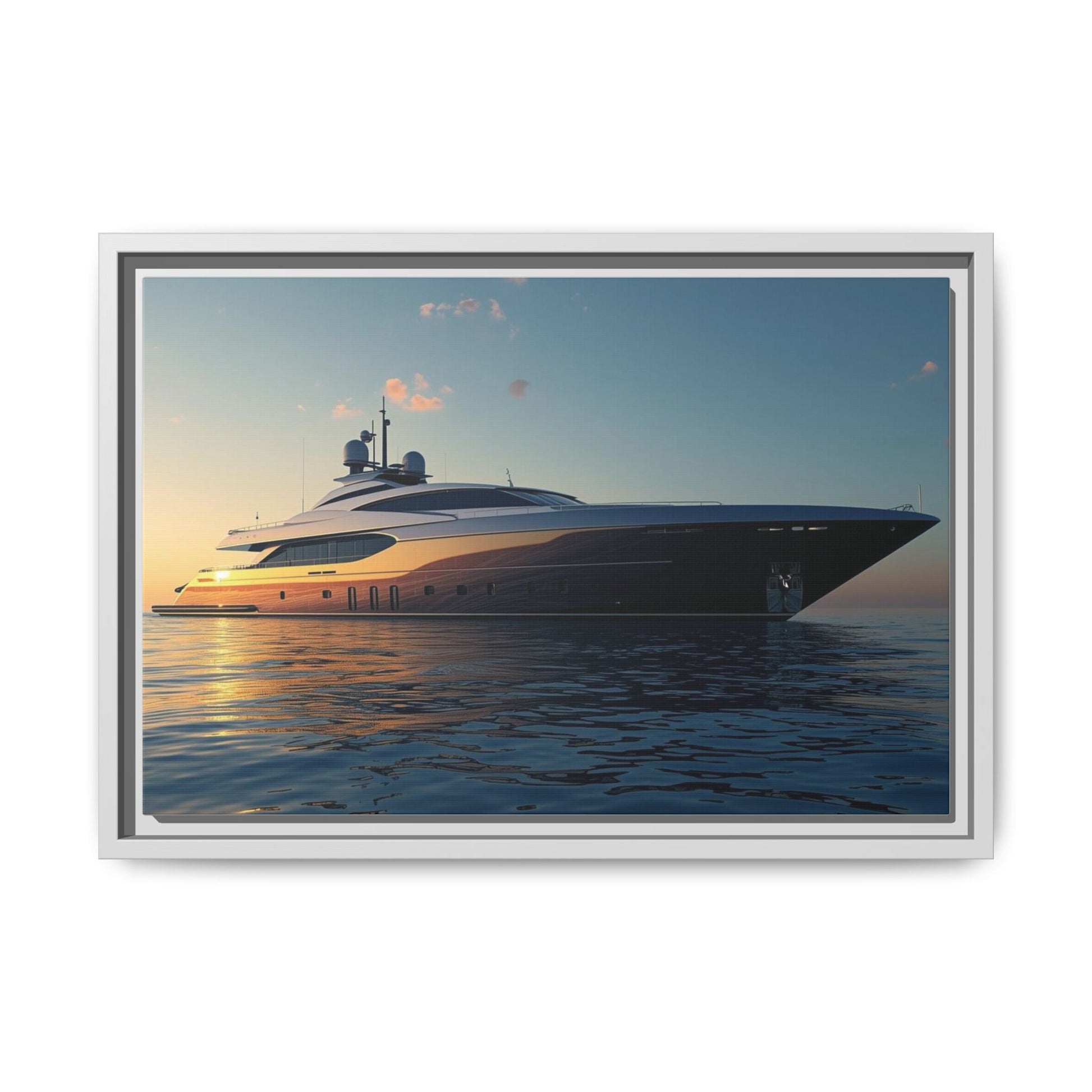 Framed photograph of a luxury yacht on the water at sunset.