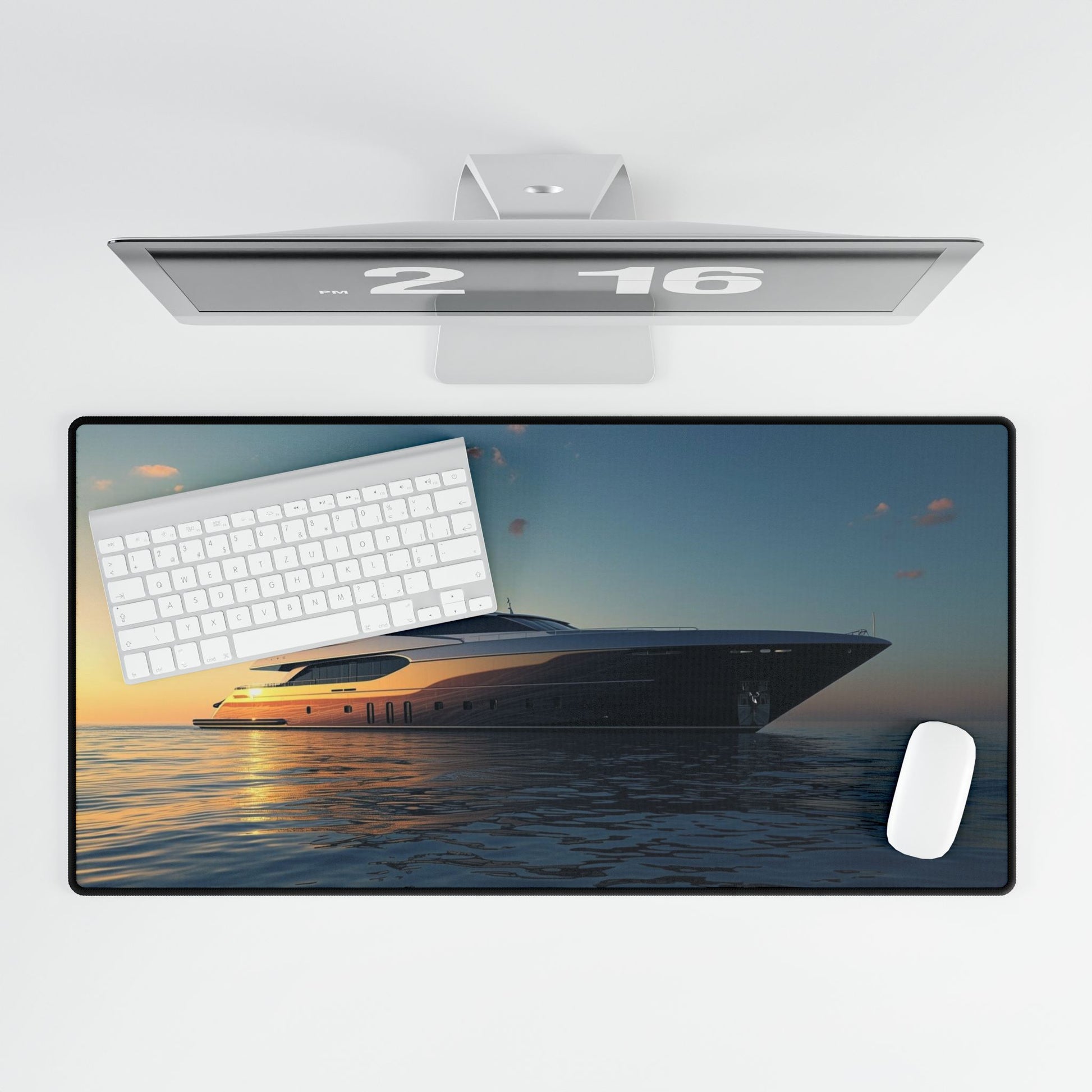 Large desk mat with a yacht design, keyboard, and mouse on a white background