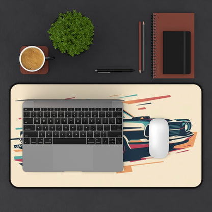Laptop on a decorative mouse pad with a car design, surrounded by office items on a black background.