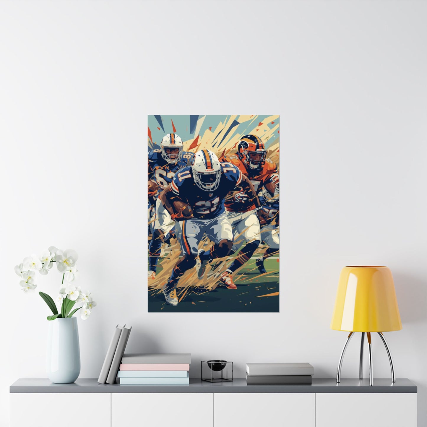 Art print of football players on a wall above a shelf with decor items.