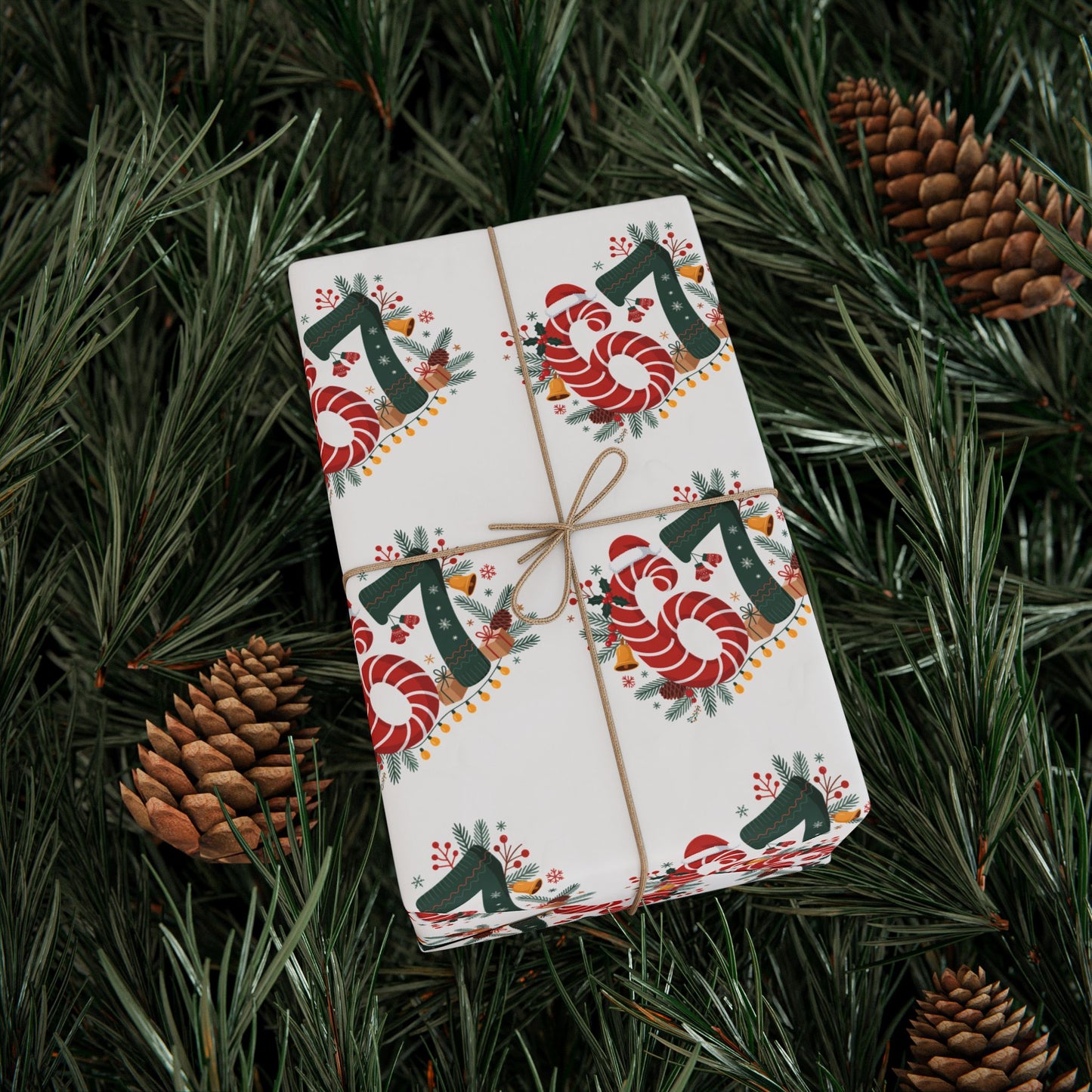 Gift wrapped in festive paper with candy cane design on a bed of pine needles.