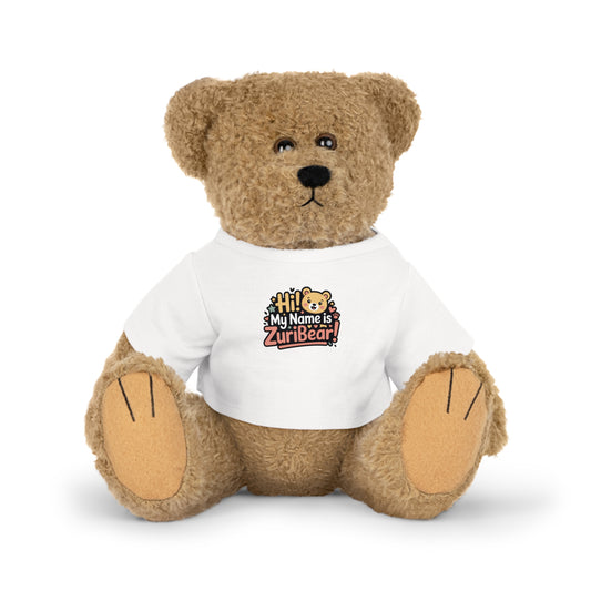 Teddy bear wearing a white shirt with 'Hi My Name is ZuriBear' text on a white background