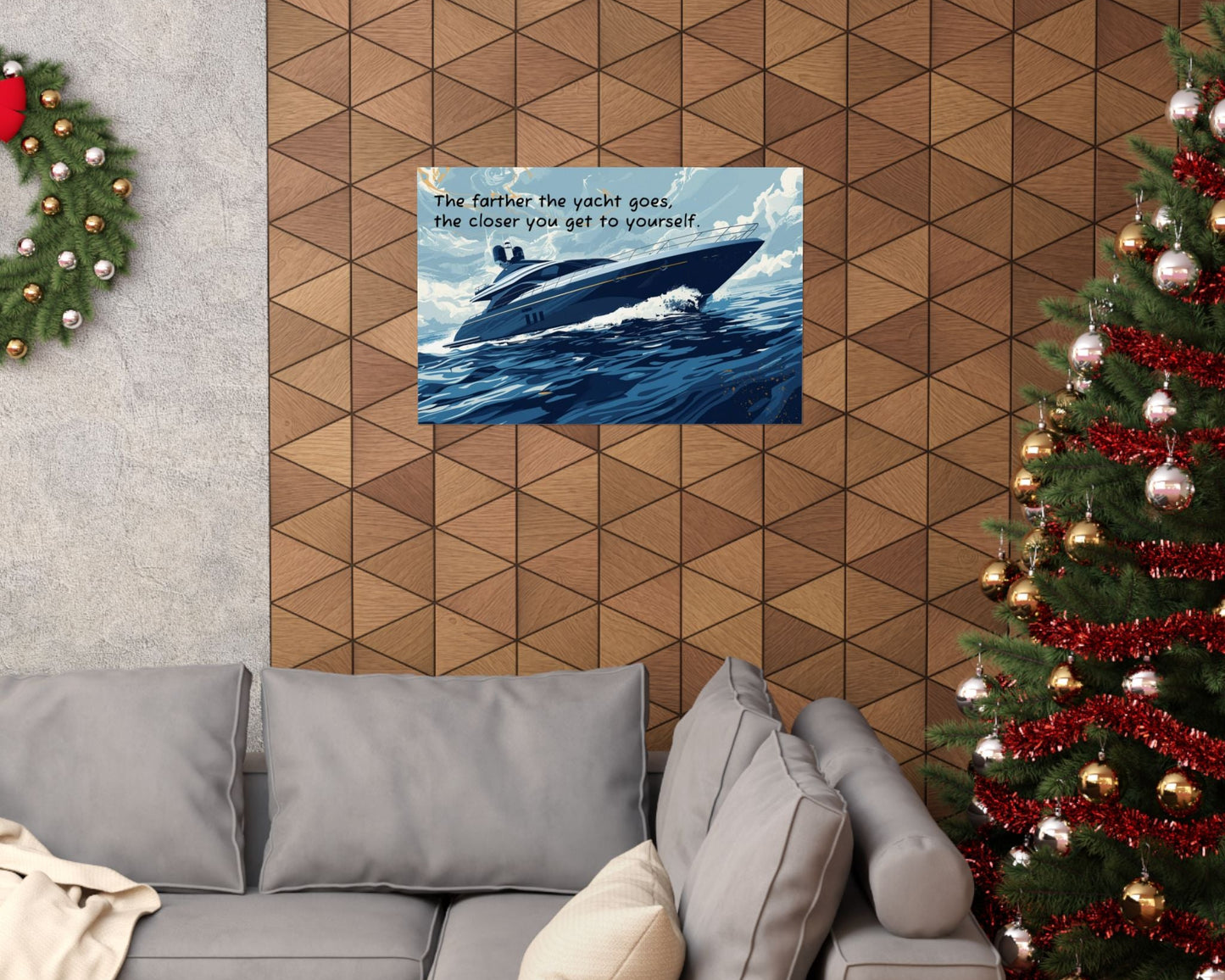 Decorative wall art with a boat on a geometric-patterned wall above a gray sofa.