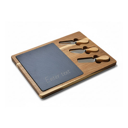 Wooden cheese board set with slate surface and four cheese knives on a white background