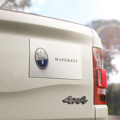 Maserati vehicle with logo and '4x4' badge on a blurred natural background