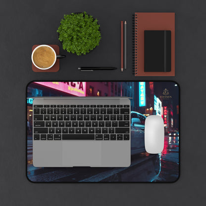 Laptop on a desk with a cityscape wallpaper, coffee cup, plant, stationery items, and a mouse pad.